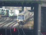 Outbound UP Express and GO Transit Lakeshore West train at Blue Jays Way